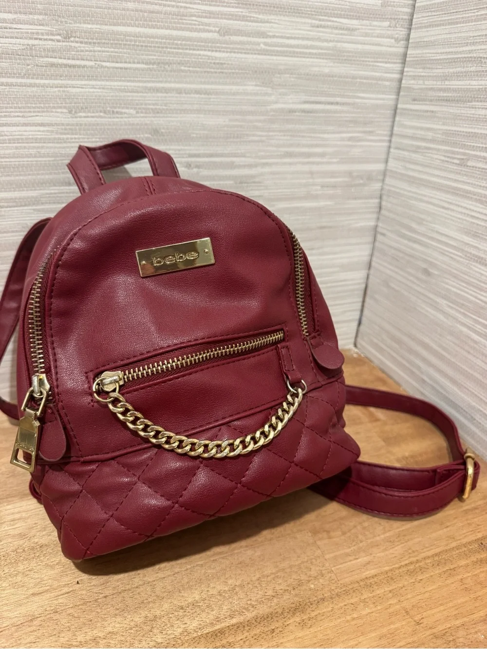 bebe Small Quilted Backpack in Burgundy with Gold Chain